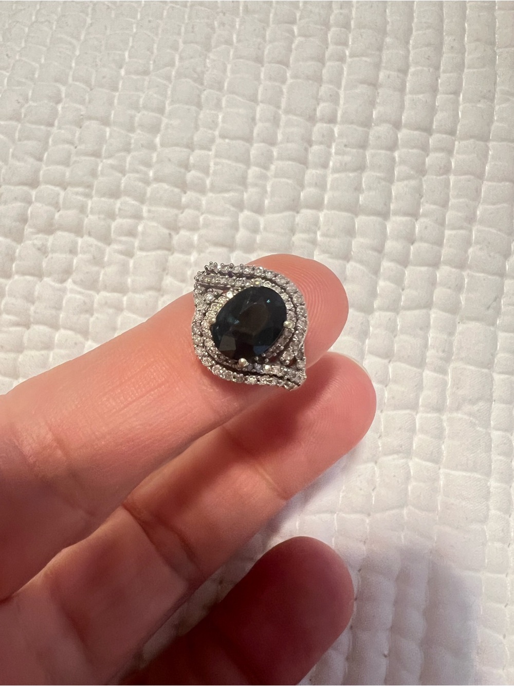 14k white gold sapphire and genuine diamonds ring.